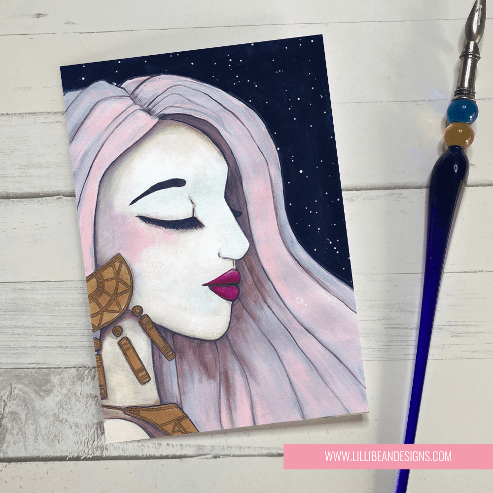 Artistic illustration of a woman's face with a starry night background, featuring LilliBean Designs branding. GREETING CARD