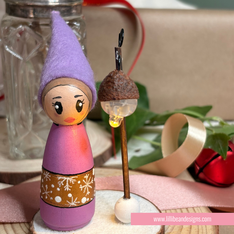 Purple Elf with a namdmade light that is on