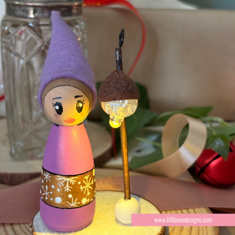 Purple Elf with a namdmade light that is on