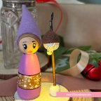Purple Elf with a namdmade light that is on
