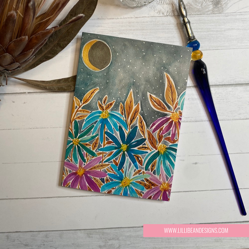 Colourful floral card with moon and star design on a wooden surface, featuring LilliiBean Designs branding. GREETING CARD