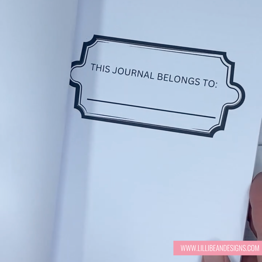 Blank journal with a label for personalization on a light blue background