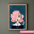 Framed illustration of a woman with pink hair against a starry night sky, displayed on a wall.