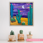 framed art work of a desert landscape in the moon light