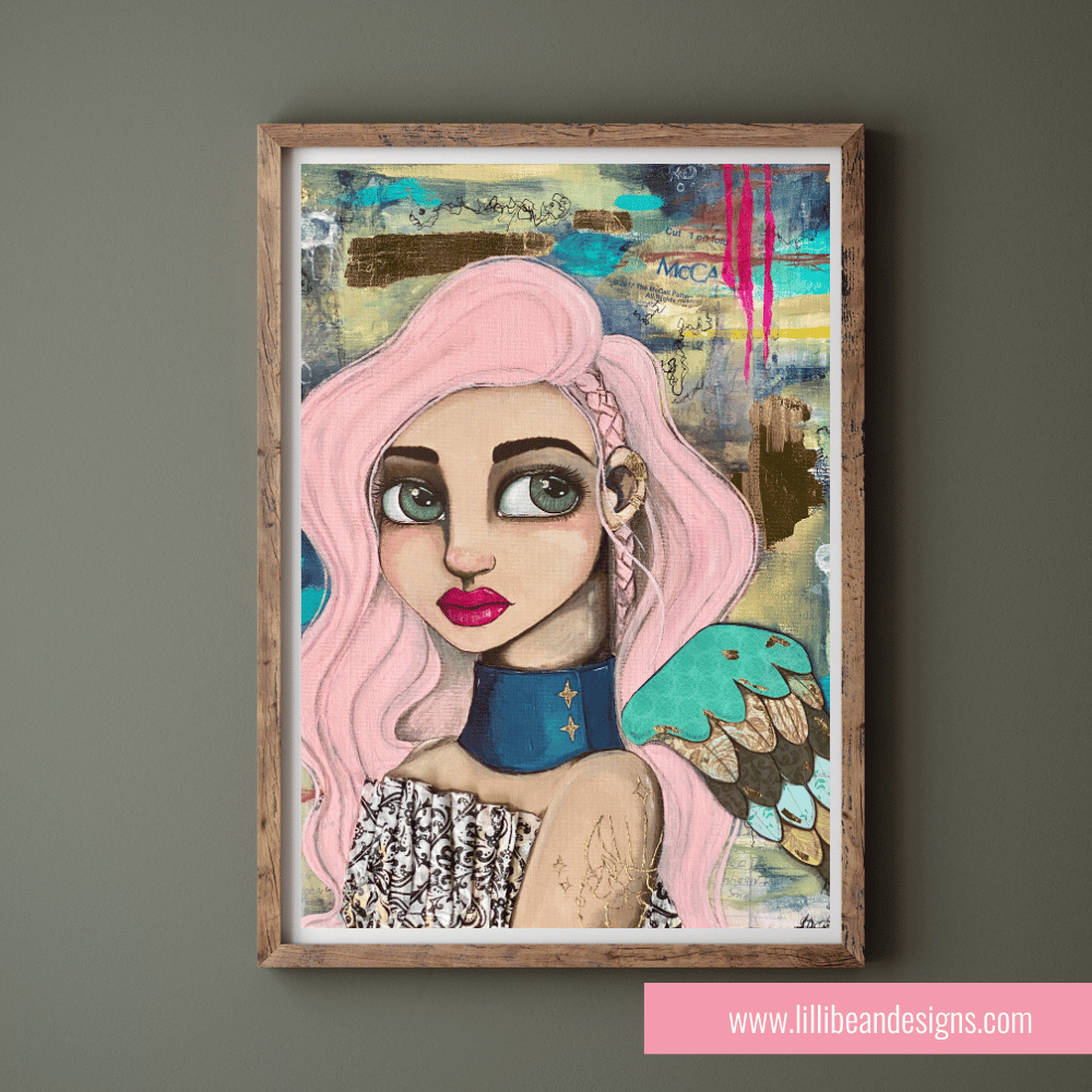 Framed artwork of a woman with pink hair on a gray wall, featuring the website www.lillibean designs.com.