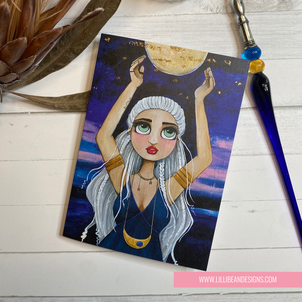 Illustration of a woman holding the moon on a card with a pen and plant in the background.