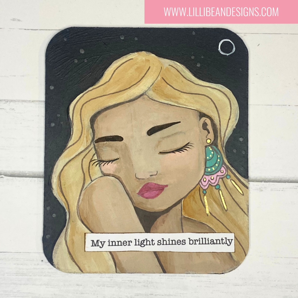 Artistic depiction of a woman's face with a motivational quote on a wooden background, featuring the artist's website.