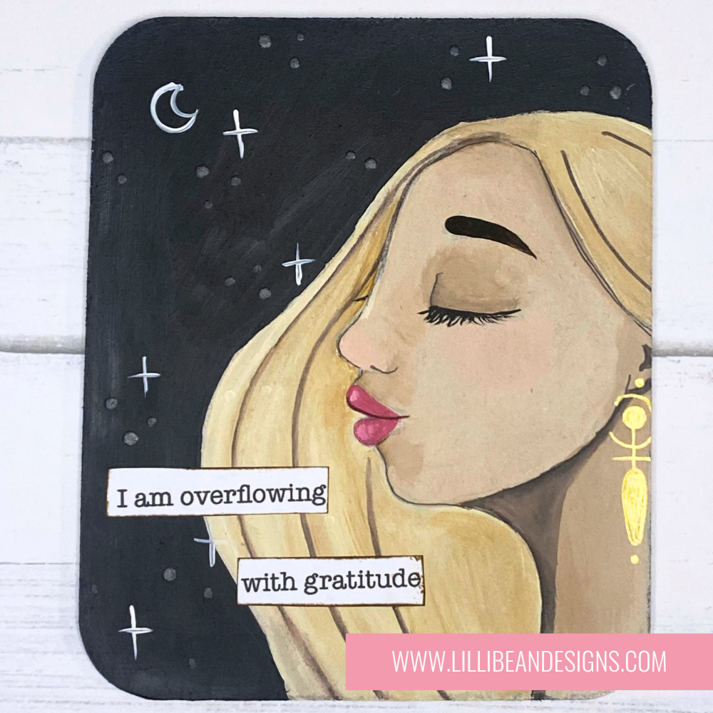 Artistic depiction of a woman's face with a motivational quote on a wooden background, featuring the artist's website.