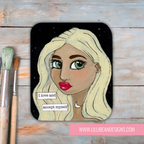 Artistic depiction of a woman's face with a motivational quote on a wooden background, featuring the artist's website.