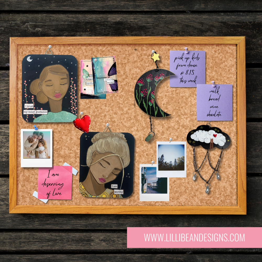 a notice board with post it notes, soul mantra paintings, mini moonscapes, day dreams and polaroid photos