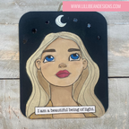 Artistic depiction of a woman's face with a motivational quote on a wooden background, featuring the artist's website.