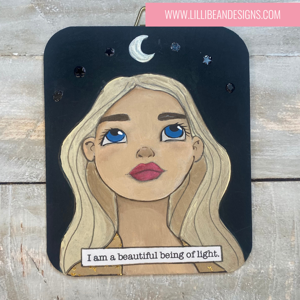 Artistic depiction of a woman's face with a motivational quote on a wooden background, featuring the artist's website.