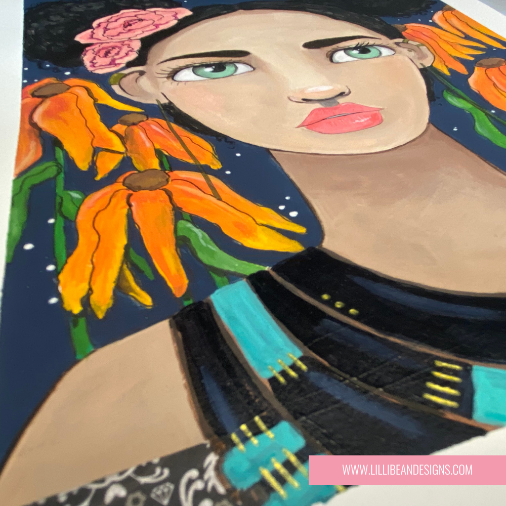 artwork of a woman with flowers in her hair on a white wall.