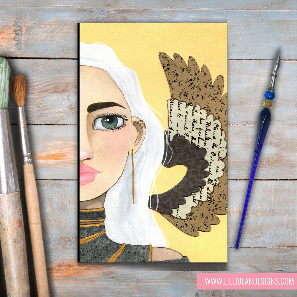 Artistic depiction of a woman with a large feathered headdress on a wooden surface with art supplies.