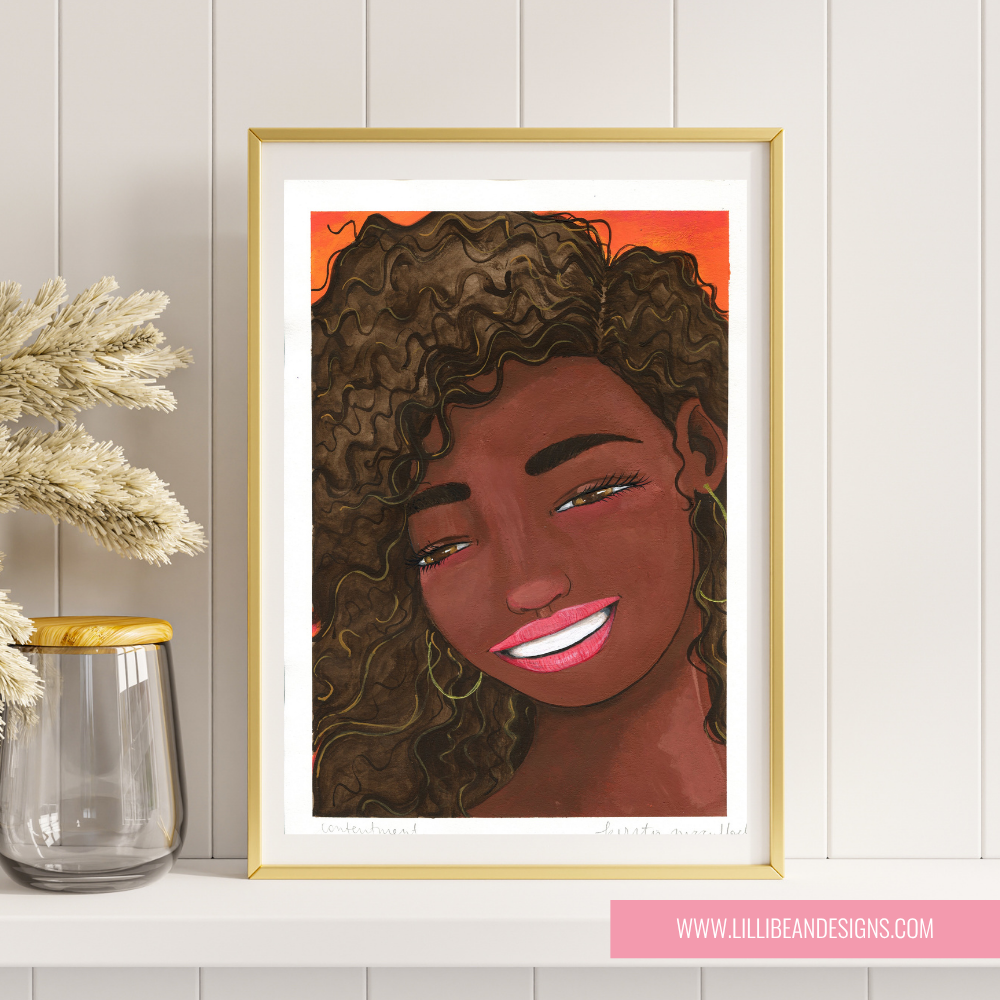 Framed artwork of a woman with curly hair on a wall with a vase and plant.