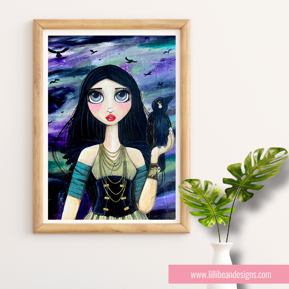 Framed artwork of a woman with a bird on her hand against a colorful background, displayed on a white wall.