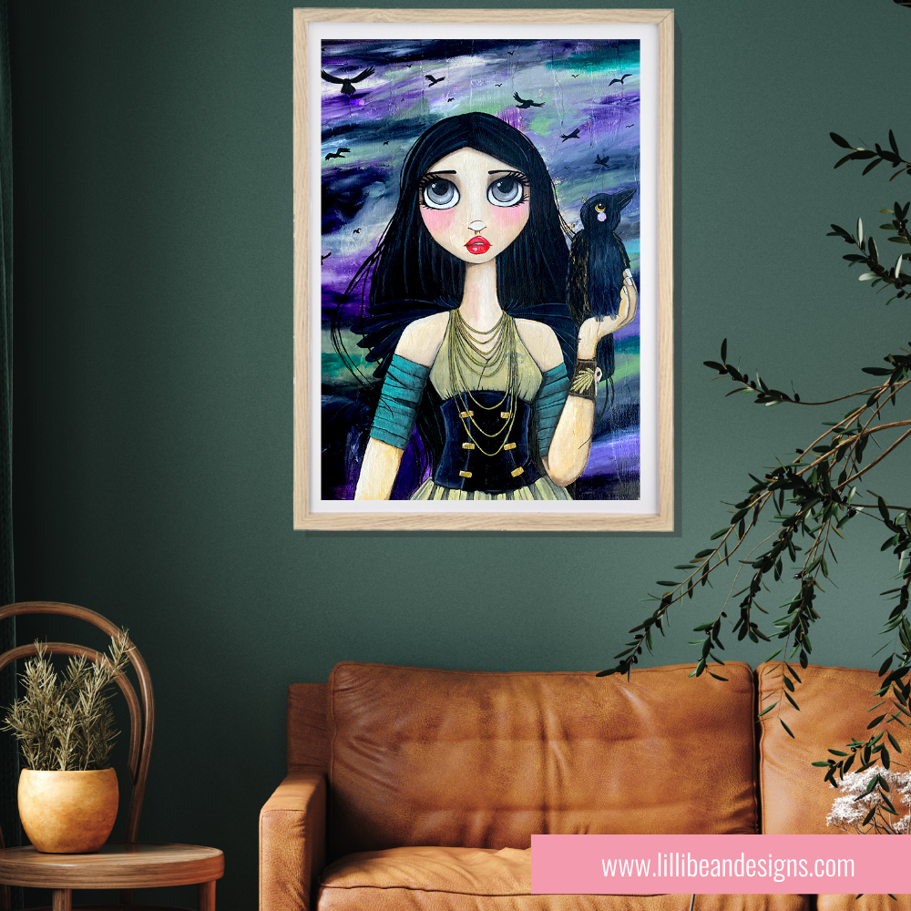 Framed artwork of a stylized woman with dark hair and a blue top, held by a crow, on a green wall above a brown leather sofa.