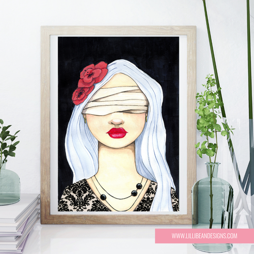 A framed art print featuring a stylized illustration of a woman with white hair, red flowers, and red lips against a black background, displayed on a shelf with decorative plants and books.