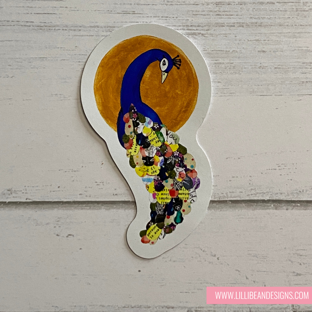 Peacock-shaped decorative item with colorful pattern on a wooden surface, featuring LillBean Designs branding. VINYL ART STICKERS - KIRSTIN MCCULLOCH LILLIBEAN DESIGNS