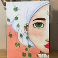 Illustration of a woman's face with green eyes  surrounded by green leaves on a peach background.