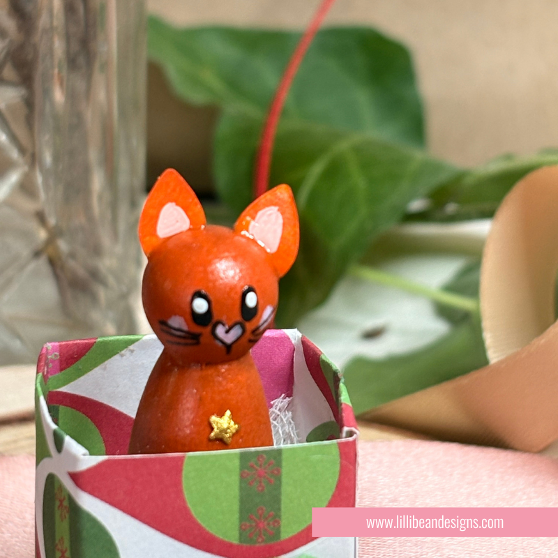 close up ginger cat handpainted wooden dolls
