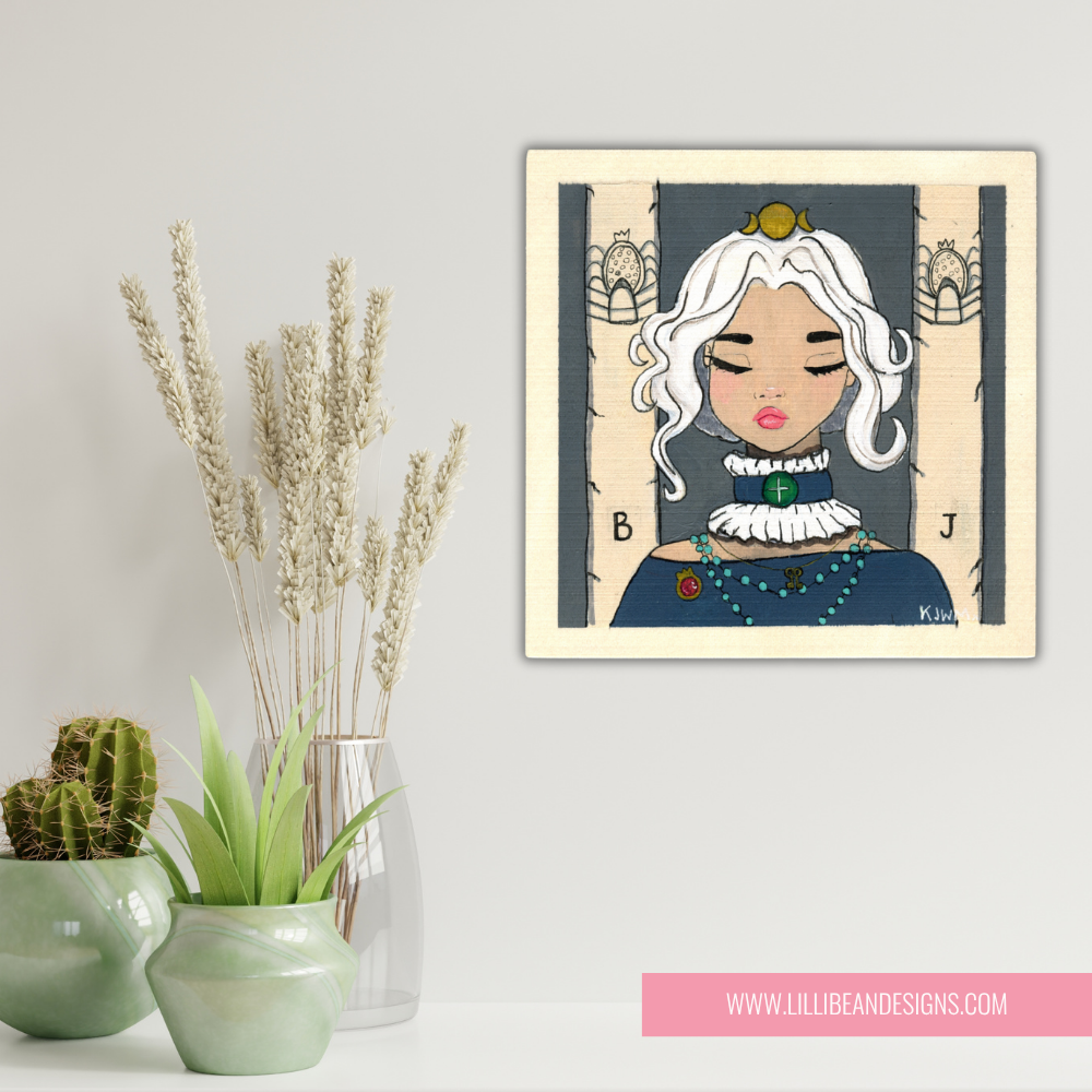 Framed artwork of a stylized portrait with decorative plants on a light gray background