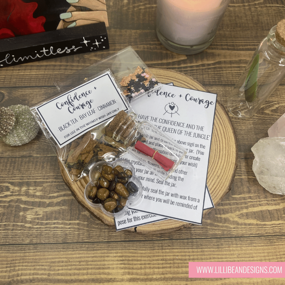 Packaged product with cards on a wooden surface, featuring 'Confidence + Courage' theme. MAGICAL WISH KIT