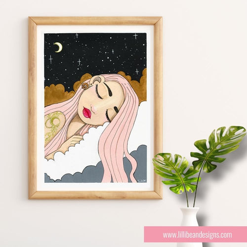 Framed artwork of a woman with pink hair and a gold headband against a night sky with stars and moon.