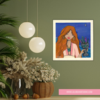 Framed artwork of a woman with red hair holding a plant, hanging on a green wall with decorative plants and lights.