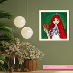 Framed artwork of a red-haired woman with a green background on a wall with decorative plants and lights.