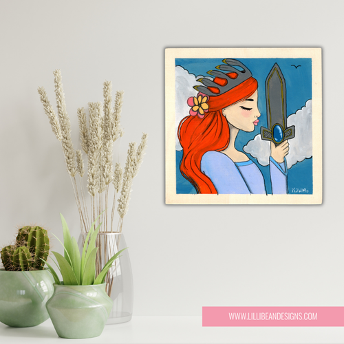 Framed artwork of a woman with red hair holding a sword, next to potted plants on a light gray background.