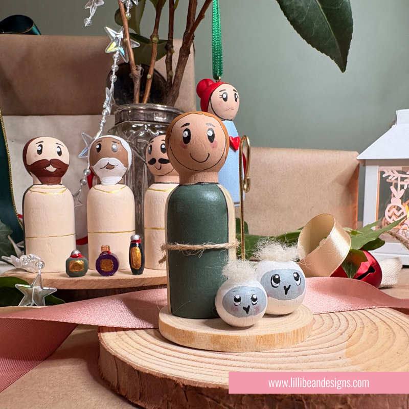 nativity scene of handpainted wooden dolls the holy family, three kings, shepherd and ange;