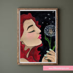 Framed artwork of a woman blowing a dandelion against a dark background, with 'Lillie Bean Designs' branding.