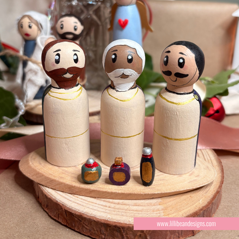 nativity scene of handpainted wooden dolls the holy family, three kings, shepherd and ange;