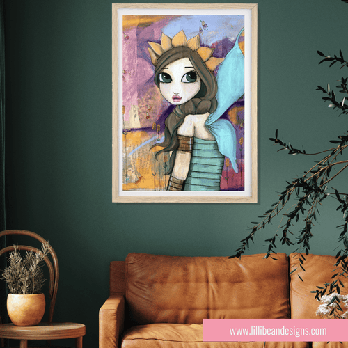 Framed artwork of a fairy character on a green wall above a brown leather sofa.